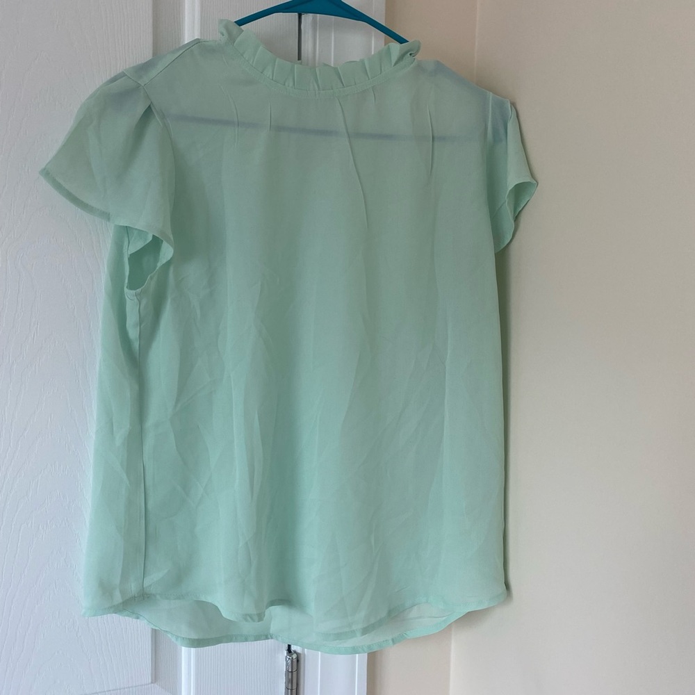Mint green blouse